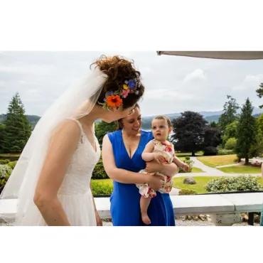 Bride with floral hair accessory outdoors