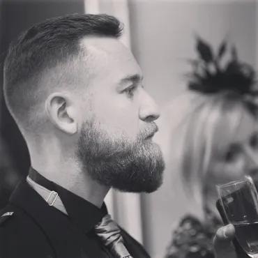 Black and white — groom side profile