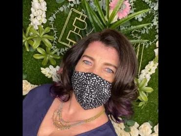 Dark brunette blowout with soft waves